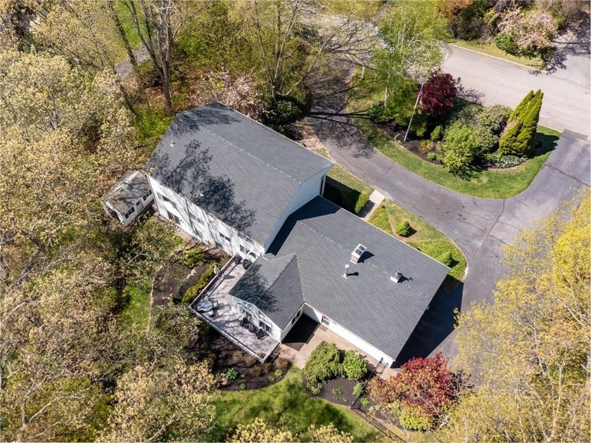 A circular driveway welcomes you to this elegant Colonial set on - photo 41