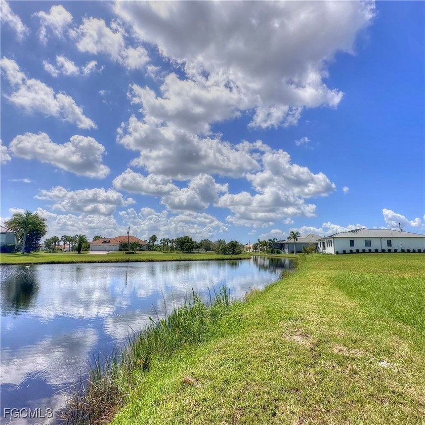 LAKEFRONT! WIDE WATER VIEW!! SOUTHEAST REAR EXPOSURE! ON QUIET - photo 8