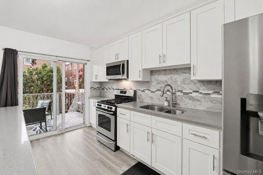 Exceptional vacant 2-family opportunity in the desirable Pelham - photo 9