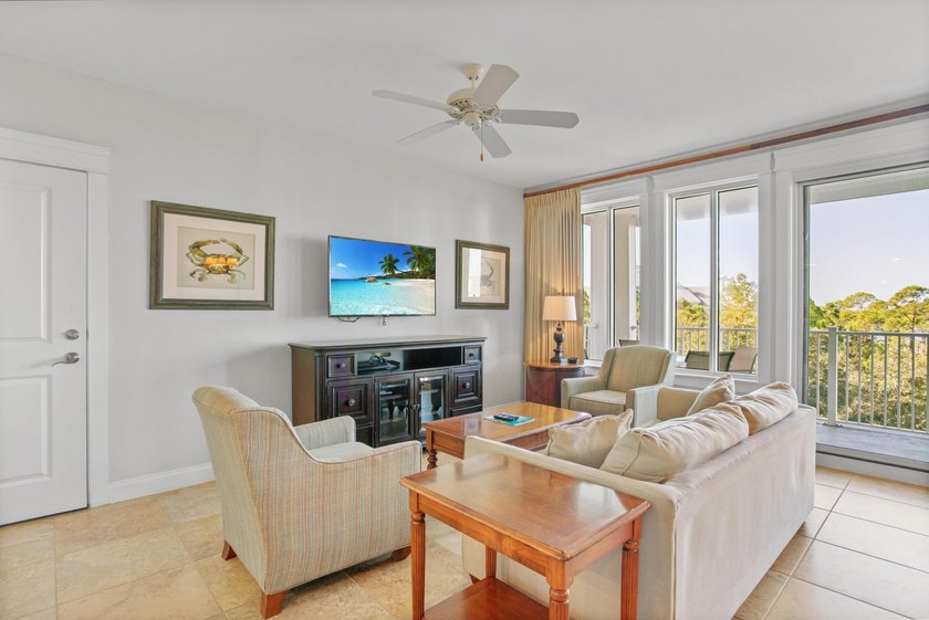 Perched on the 5th floor of Grand Sandestin, this beautifully - photo 7
