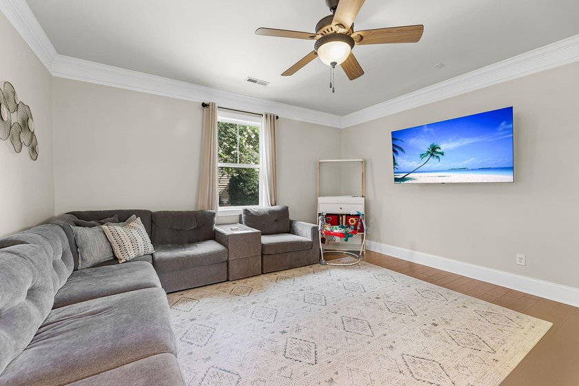 Nestled on a desirable corner lot, this beautiful two-story home - photo 12