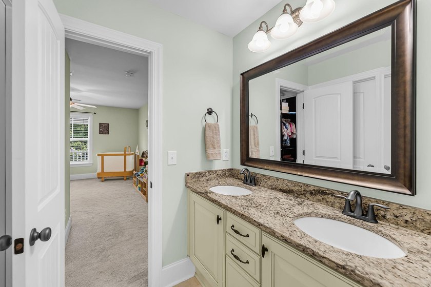 Nestled on a desirable corner lot, this beautiful two-story home - photo 29