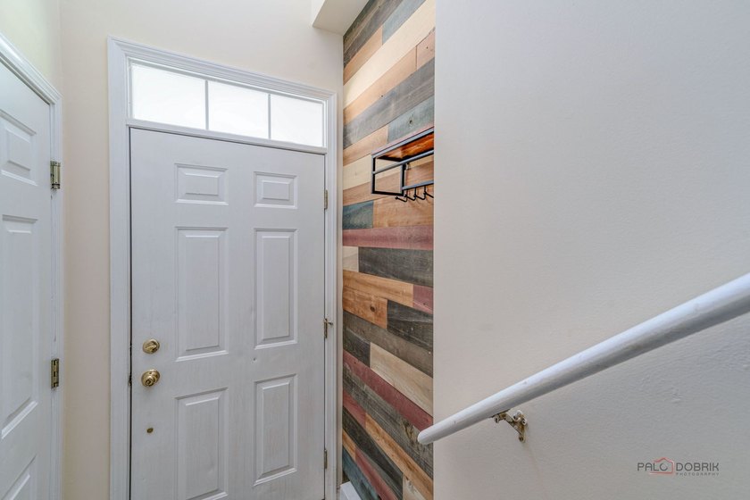 Welcome to this bright and spacious end-unit townhouse in the - photo 5