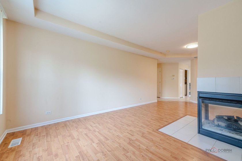 Welcome to this bright and spacious end-unit townhouse in the - photo 7