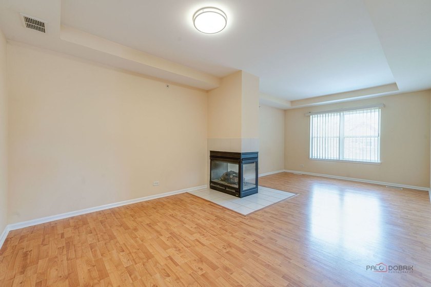 Welcome to this bright and spacious end-unit townhouse in the - photo 9