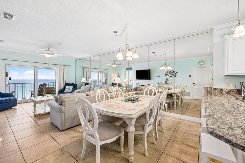 Perched on the fifth floor of Emerald Dunes, this beautifully - photo 8