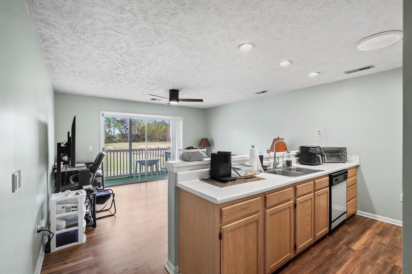 Welcome to 597 Blue River Court, a bright and well-maintained - photo 3