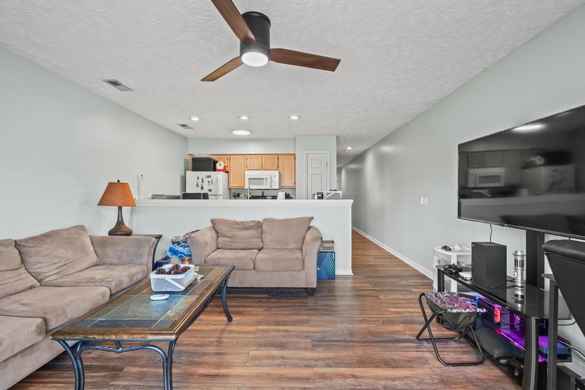 Welcome to 597 Blue River Court, a bright and well-maintained - photo 4