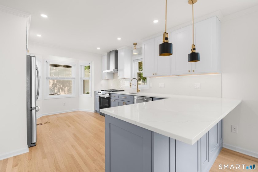 Location, Location, Location! This stunningly remodeled - photo 12