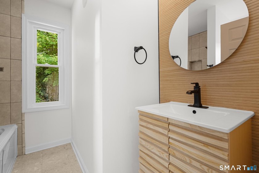Location, Location, Location! This stunningly remodeled - photo 19