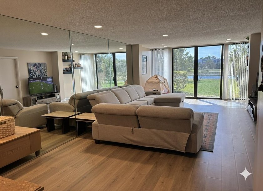 Welcome home to this spacious 2-bedroom, 2-bathroom first-floor - photo 2