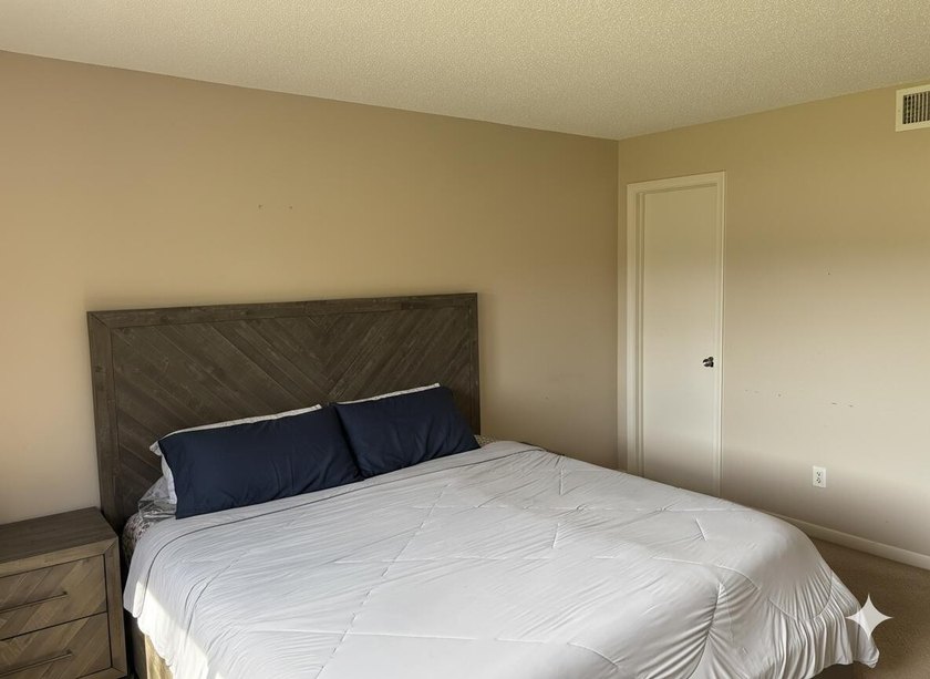 Welcome home to this spacious 2-bedroom, 2-bathroom first-floor - photo 8