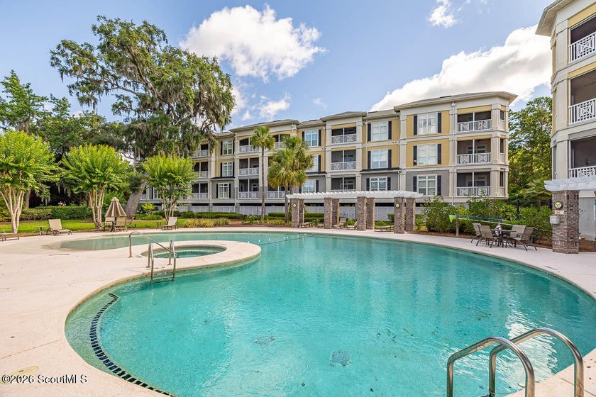 A rare opportunity to own a top-floor, rear corner residence in - photo 30