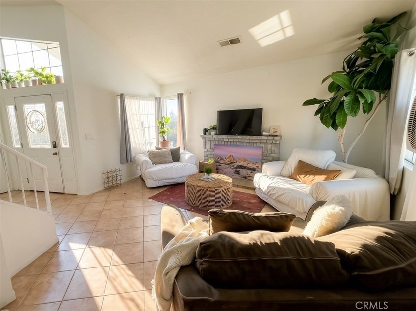 Welcome home to this charming two-story residence located in the - photo 2