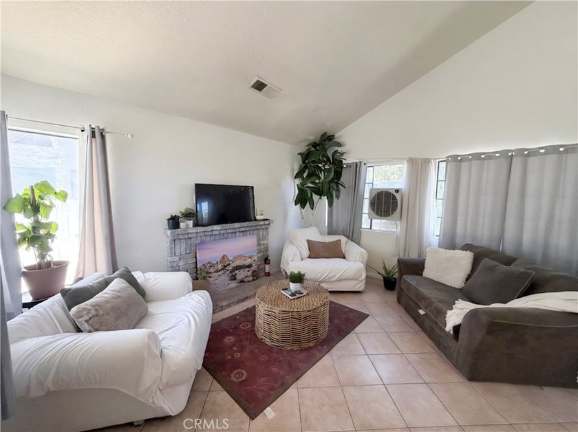 Welcome home to this charming two-story residence located in the - photo 3