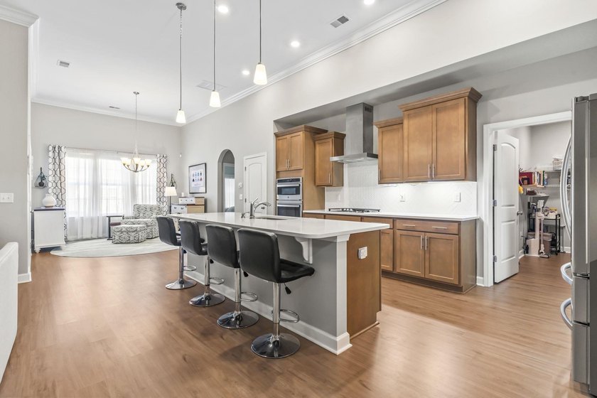Three-bedroom, three-bathroom Craftsman-style home with a - photo 3