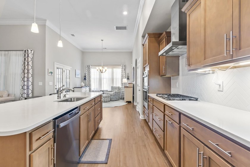 Three-bedroom, three-bathroom Craftsman-style home with a - photo 10