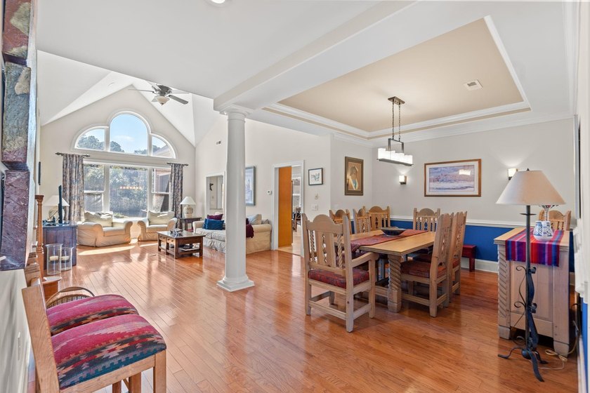 Nestled in a beautiful lakefront setting, this all-brick - photo 5
