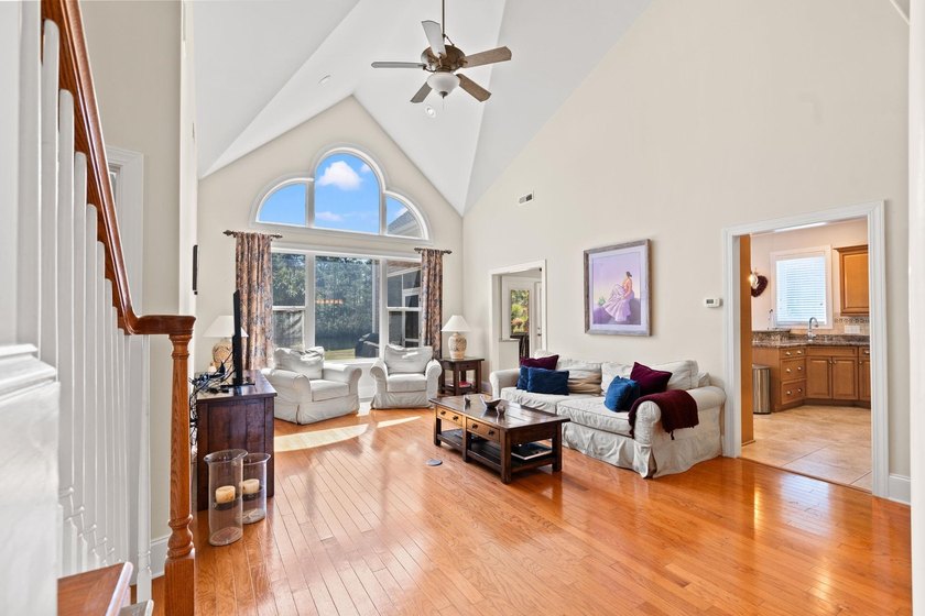 Nestled in a beautiful lakefront setting, this all-brick - photo 6