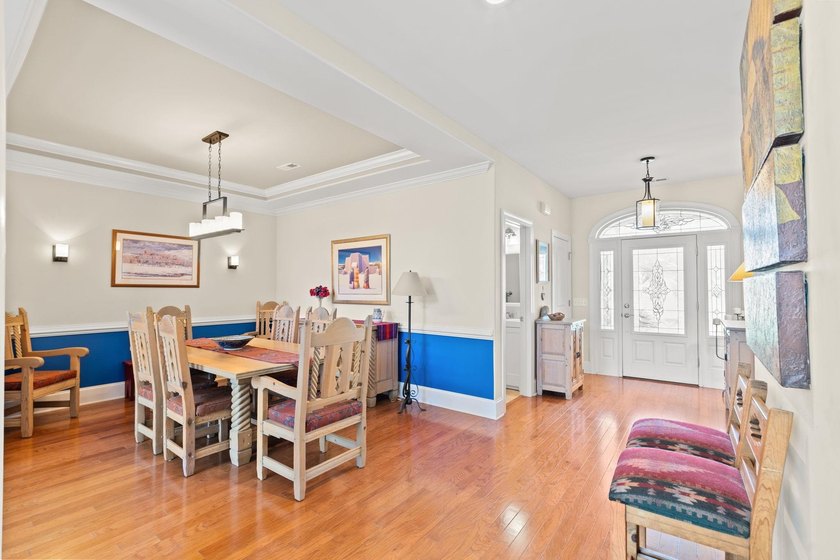 Nestled in a beautiful lakefront setting, this all-brick - photo 7