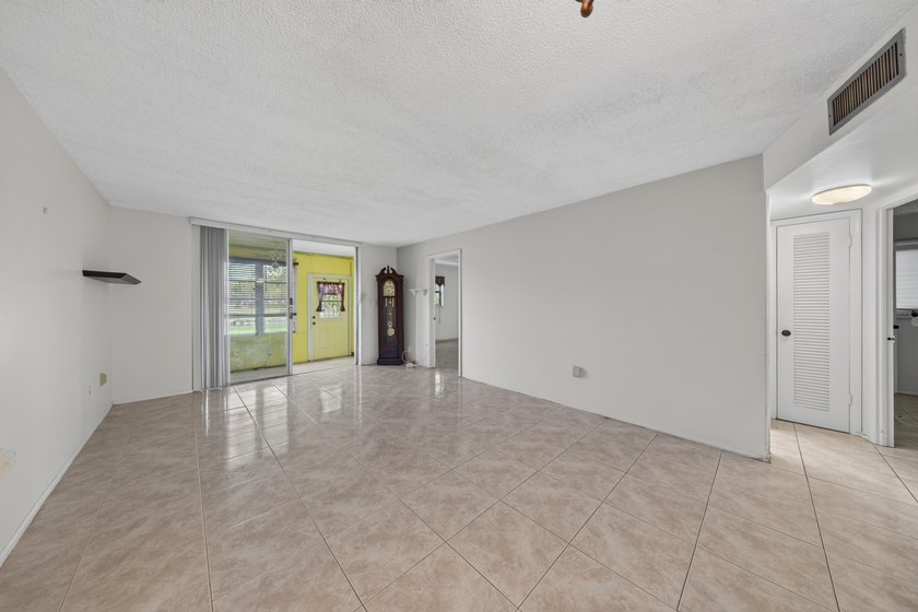 Desirable first-floor end unit in Sunrise Lakes Phase One! This - photo 18