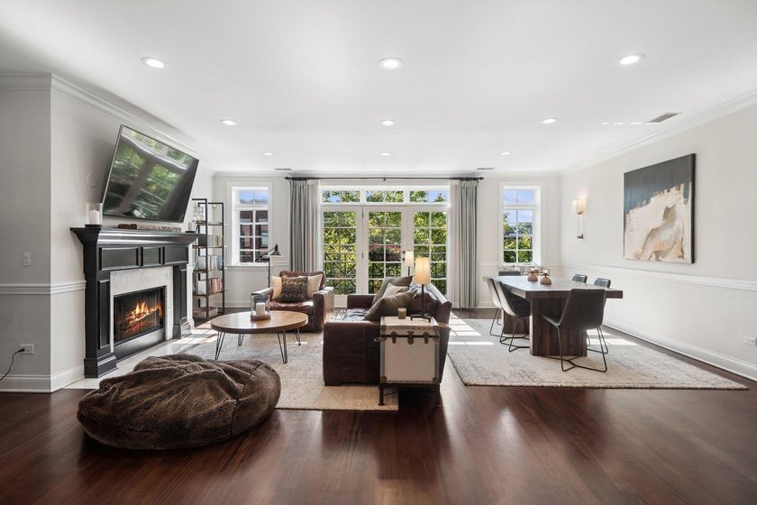 Set on a rare extra-wide 30' lot in one of Lincoln Park's most - photo 3