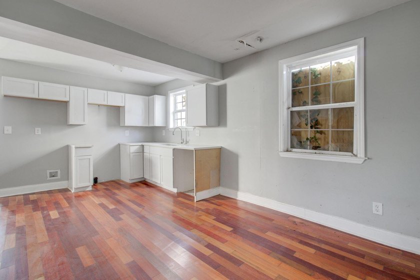Partially renovated two-story home in a great location! Walk to - photo 10