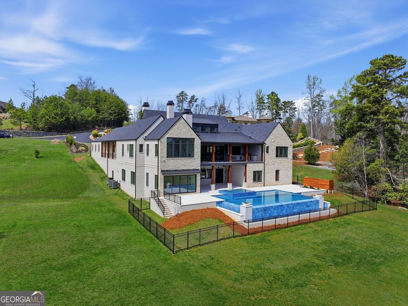 New construction on Lake Lanier in the gated Lyonesse Estates - photo 2