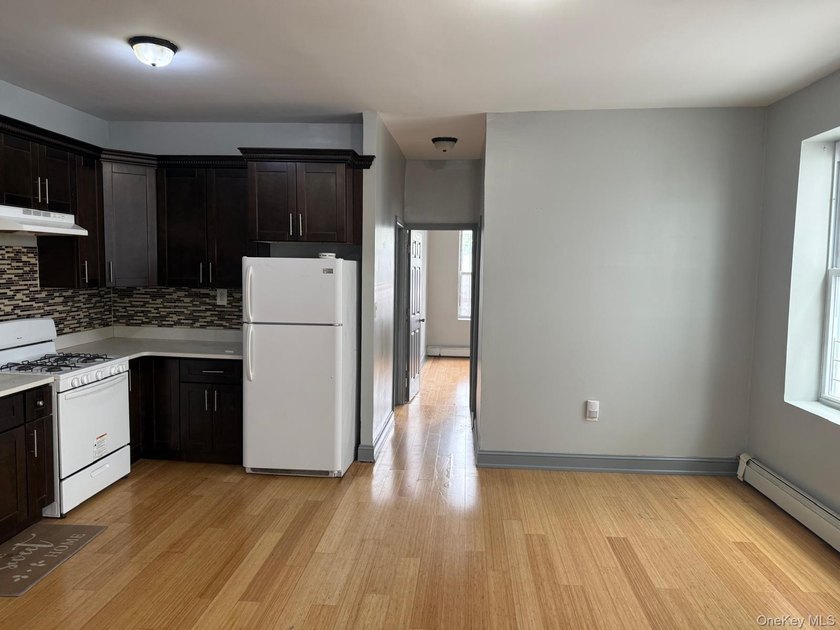 Opportunity knocks with this well-maintained 3-family property - photo 2