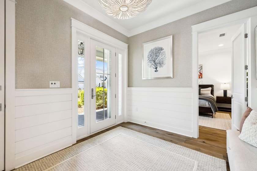 Located in WaterSound Origins, this Ficus plan built by Huff - photo 6