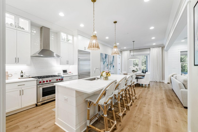 Located in WaterSound Origins, this Ficus plan built by Huff - photo 8