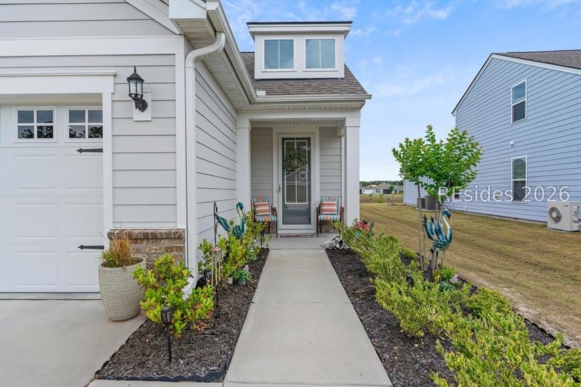 Welcome to this Hallmark floor plan in the highly sought-after - photo 2