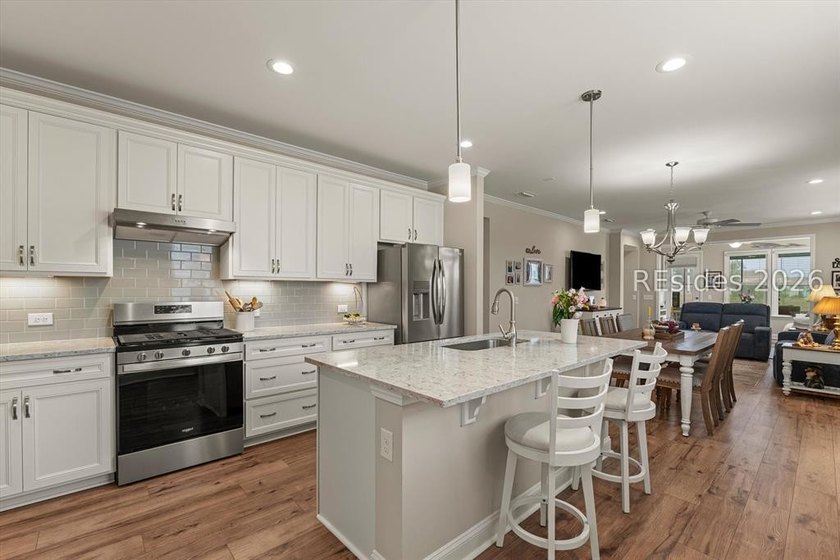 Welcome to this Hallmark floor plan in the highly sought-after - photo 4