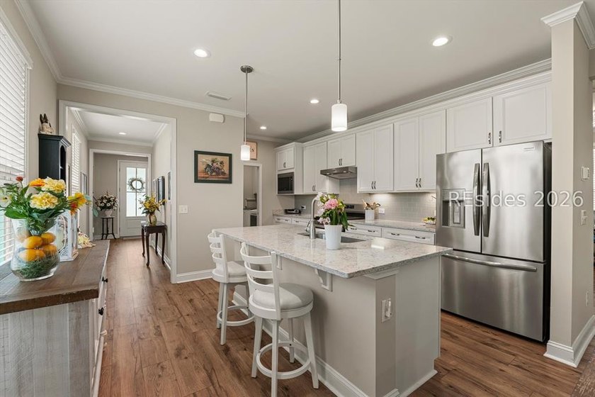 Welcome to this Hallmark floor plan in the highly sought-after - photo 5