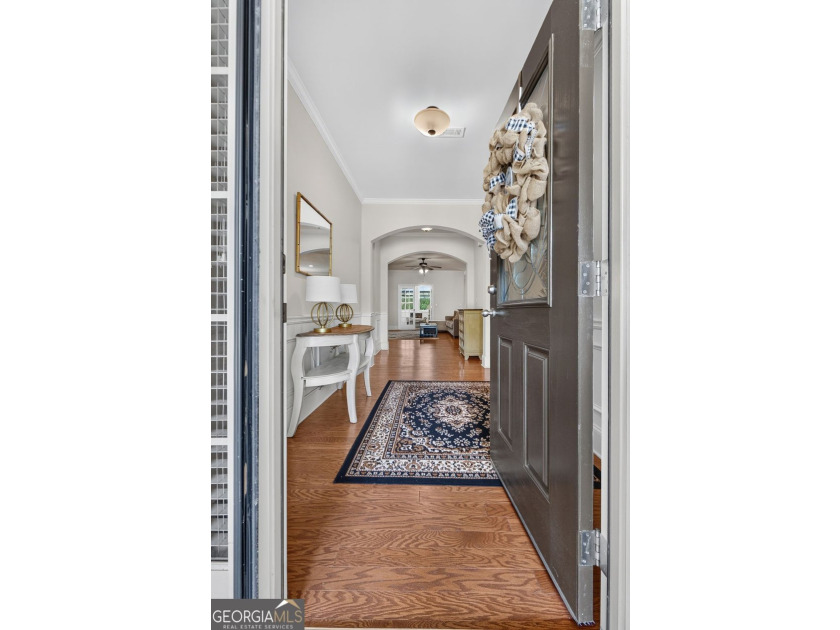 This charming 3-bedroom, 2-bath home is nestled in the sought - photo 7