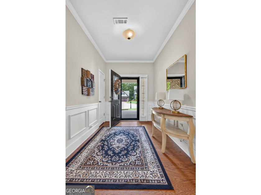 This charming 3-bedroom, 2-bath home is nestled in the sought - photo 8