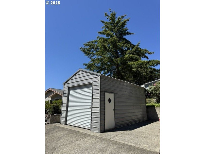 Welcome to this well-maintained 1,410-square-foot home nestled - photo 2