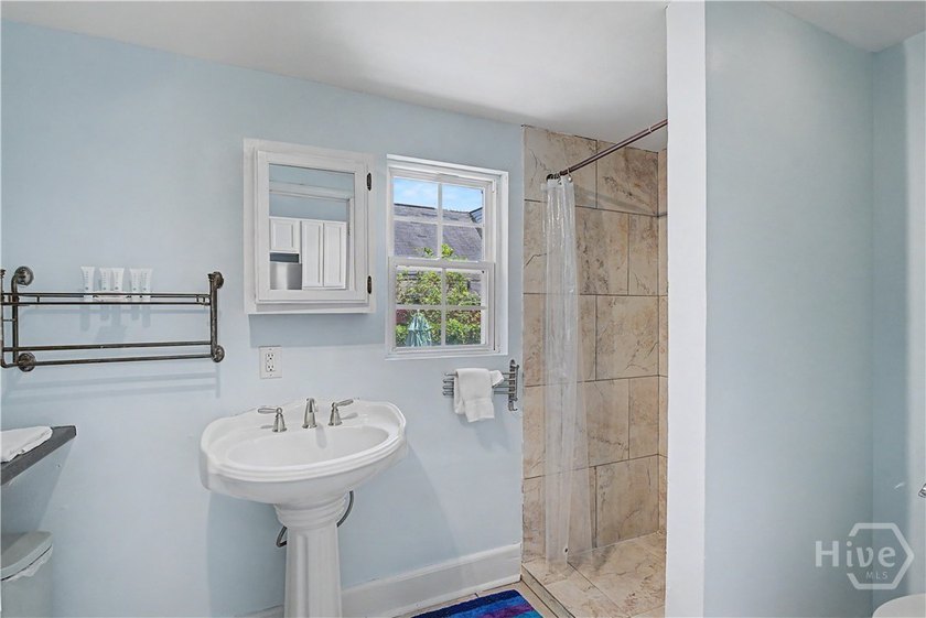 Welcome home to this charming Savannah bungalow, where historic - photo 14