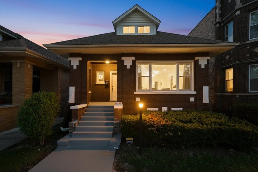 Step into this spacious 4 bedroom, 3 bathroom home set on a - photo 2