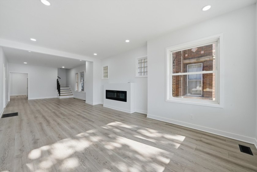 Step into this spacious 4 bedroom, 3 bathroom home set on a - photo 3