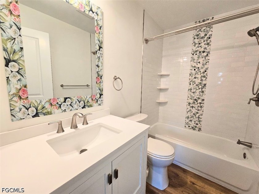 This REMODELED ATTACHED VILLA is located in the very Lushly - photo 14