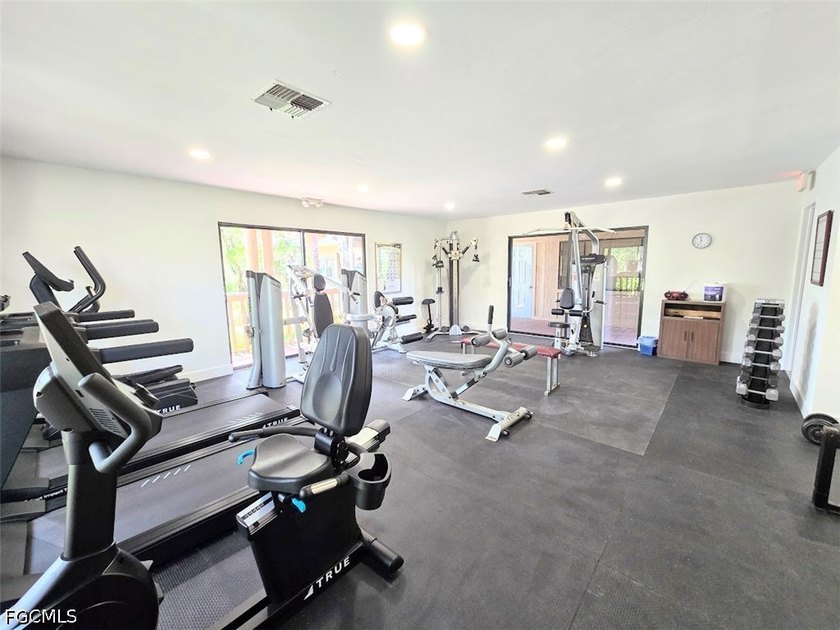 This REMODELED ATTACHED VILLA is located in the very Lushly - photo 31