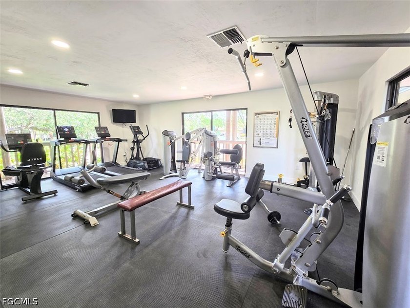 This REMODELED ATTACHED VILLA is located in the very Lushly - photo 32
