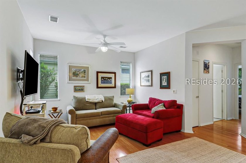 Tucked beneath a canopy of mature trees on the desirable - photo 8
