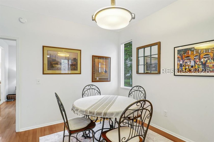 Tucked beneath a canopy of mature trees on the desirable - photo 10