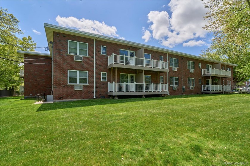 Welcome home to this bright and inviting remodeled 1st floor - photo 13