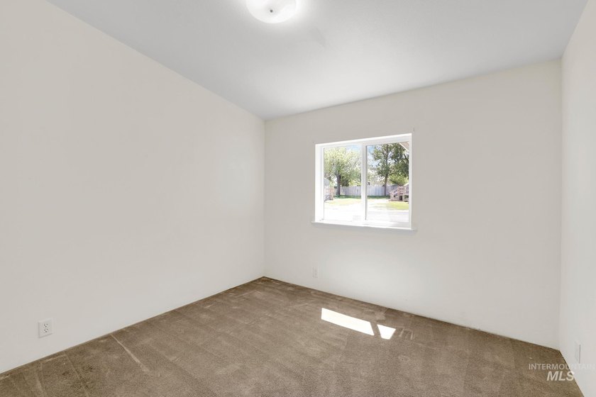 Welcome home to this inviting 3-bedroom, 2-bath manufactured - photo 12