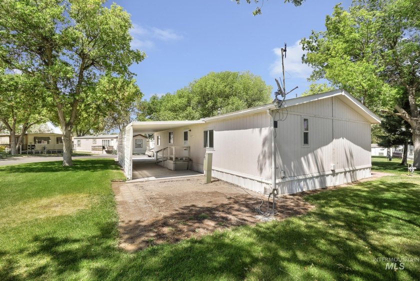 Welcome home to this inviting 3-bedroom, 2-bath manufactured - photo 15