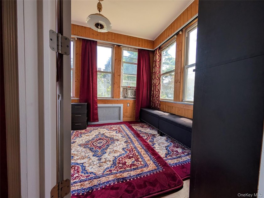 Welcome to this well maintained 5-bedroom, 2-bathroom home in - photo 12
