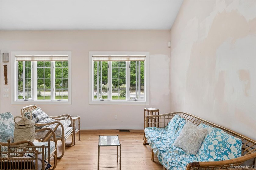 Set on a private 1.18-acre property in Hampton Bays, this - photo 13